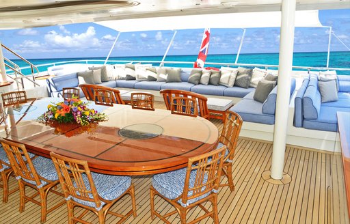 The upper aft deck dining and seating area