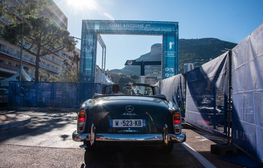 Rear view of a Mercedes car under a sign reading Quai Antoine at the Monaco Yacht Show