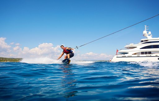 guest water skiing on luxury yacht spirit 