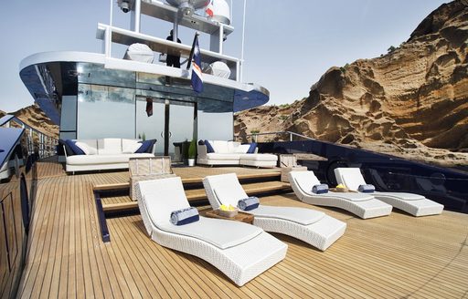 sun loungers lined up on sundeck of motor yacht BLADE