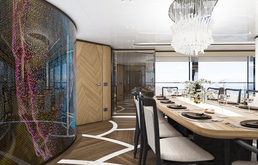 Interior dining area onboard charter yacht ETERNAL SPARK, formal dining set up to starboard with large windows aft