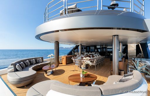 large alfresco dining area on the upper deck aft of luxury yacht SOLO