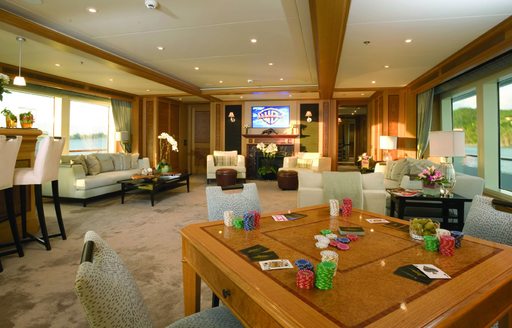 A view of the skylounge on board superyacht UTOPIA as seen from the games table
