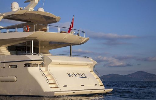 Stern of charter yacht RINI as she cruises on charter in the Mediterranean