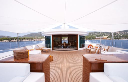 upper deck with sun awning and lounging on board luxury yacht ‘Lady Christine’ 
