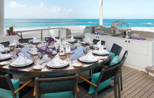 Dining table on upper deck of superyacht SIREN