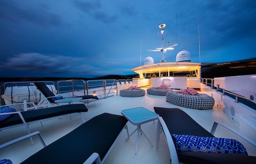 flybridge with loungers, seating and bar on board luxury yacht CORROBOREE 