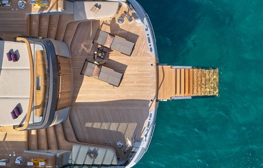 beach club and swim platform aerial shot on luxury yacht geco