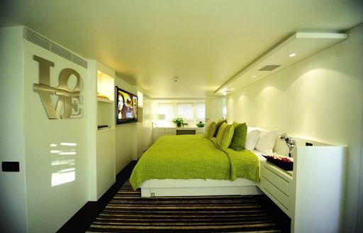 contemporary styled master suite on board charter yacht BERZINC 