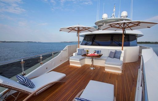 a secluded sunning and lounge area on bridge deck forward of motor yacht ‘Far Niente’ 