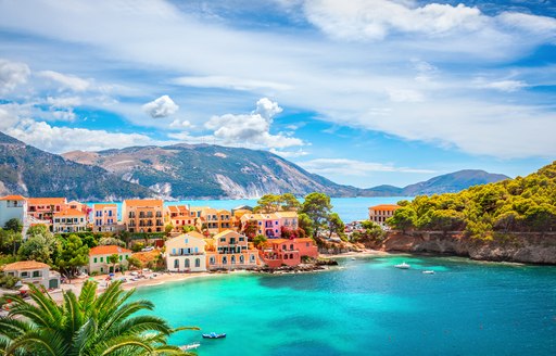 brightly coloured town on the water in greece, assos in kefalonia