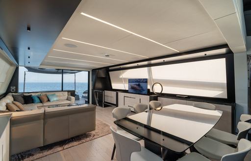 Dining area in the main salon onboard charter yacht SOPHIA