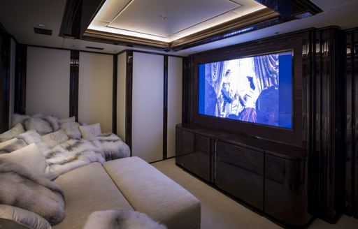 Dedicated cinema suite on board charter yacht ILLUSION V