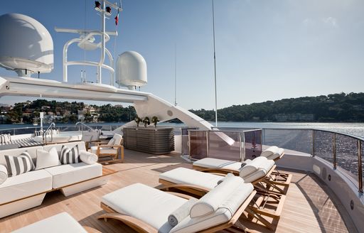sun loungers, sofa and Jacuzzi lined up on sundeck of luxury yacht THUMPER 
