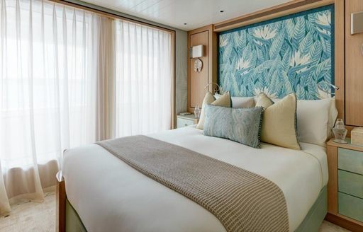 A double cabin on board Feadship luxury yacht JOY