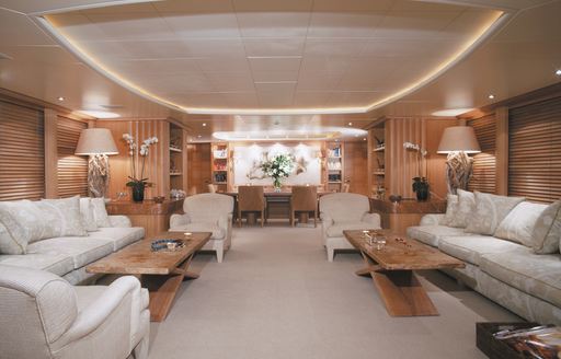 main salon with light oak panelling on board charter yacht ALEXANDRA