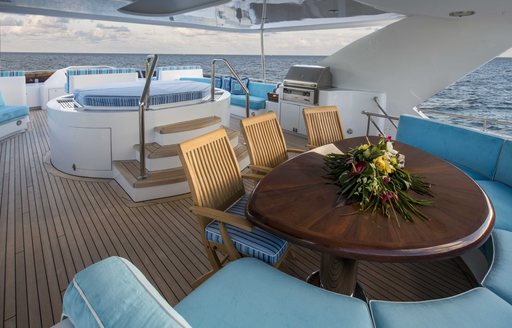 alfresco dining area on the sundeck of motor yacht ‘Lady Bee’