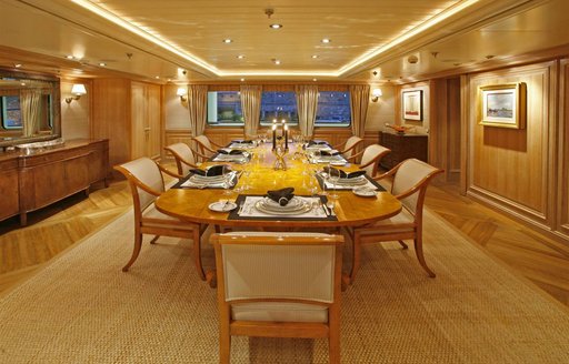 Formal dining on board charter yacht TATOOSH