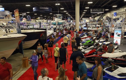 FLIBS indoor exhibition, people browsing boats and accessories