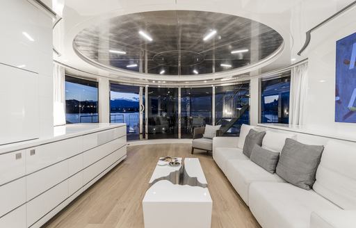 Main salon with white interior aboard superyacht Her Destiny