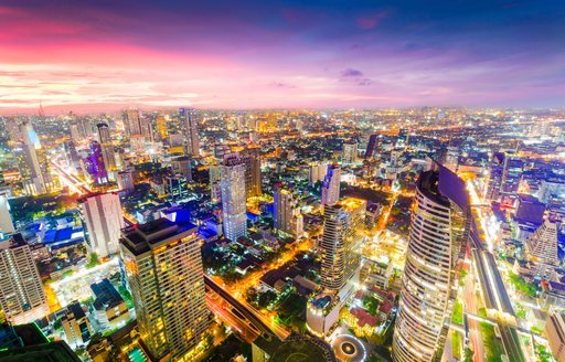 Aerial view of highrise buildings of Bangkok at twilight