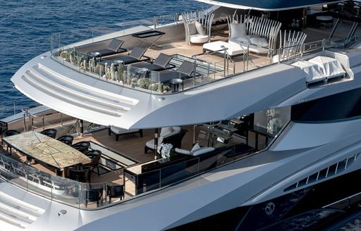 Aft decks of charter yacht sarastar, with sun loungers visible on fly deck