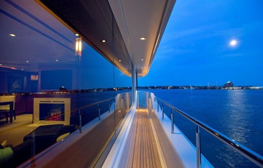 side deck of charter yacht ‘Far Niente’ with glimpse into skylounge