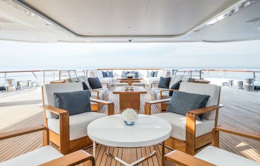 aquila social seating and dining on upper deck aft