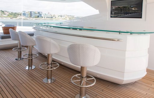 long sundeck bar with bar stools under the radar arch on board charter yacht ‘Princess AVK’ 