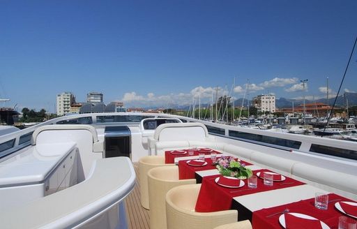 table set for alfresco dining on flybridge of charter yacht ‘Paris A’ 