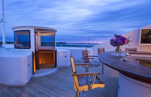 bar and 'pop top' staircase on sundeck on superyacht RHINO 
