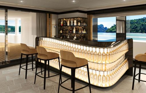 Wet bar onboard charter yacht PROJECT X, with four surrounding stools