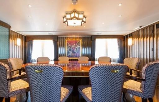The formal dining area on board motor yacht MALAHNE