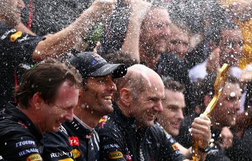 winning team open champagne at Monaco grand prix 2013