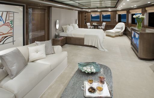 The nuetral coloured master stateroom on board OceanCo superyacht ALFA NERO