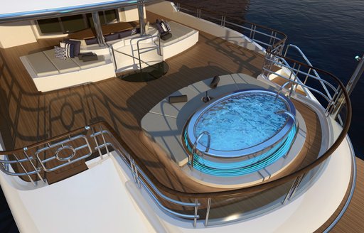 Elevated view looking down at the on-deck Jacuzzi onboard motor yacht LADY MAJA I 