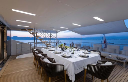 beautiful dining area onboard luxury superyacht charter