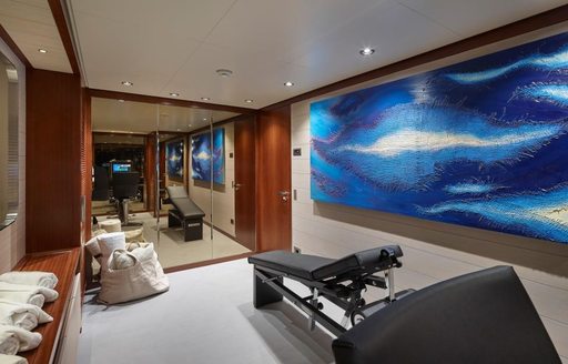 gym with artwork on board luxury yacht MOKA
