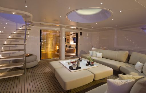 aft deck area with shaded lounge area aboard superyacht PANTHALASSA 