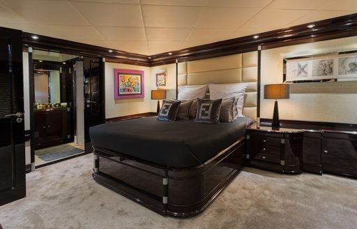 Cabin onboard charter yacht INDIGO STAR I, central berth facing forward with ample storage