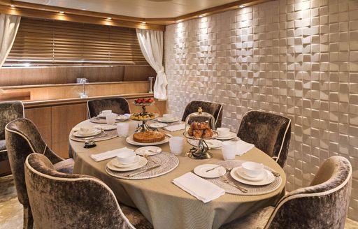 dining table in the main salon of luxury yacht AMAYA 