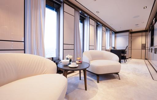 Seating area in the master cabin onboard charter yacht RELIANCE