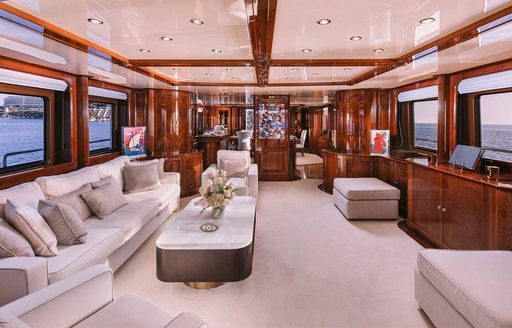 Main salon onboard charter yacht OAK, spacious lounge area with plush seating