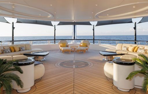 beautiful open expansive deck space onboard luxury superyacht charter yacht AHPO