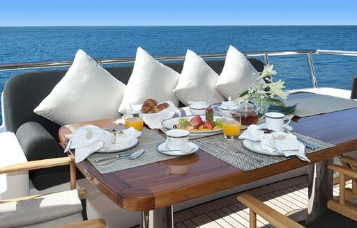 Aft deck dining on Christina G yacht