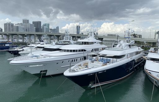 a fleet of luxury superyachts berthed in florida as part of the miami yacht show 2020