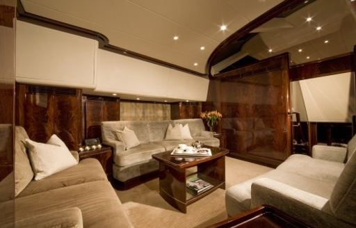 rich timbered main salon on board luxury yacht LUDYNOSA G