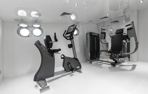 Gym equipment in the fitness room on board superyacht Enigma XK