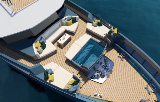 Aerial rendering looking down on an infinity pool at the bow of charter yacht KB6
