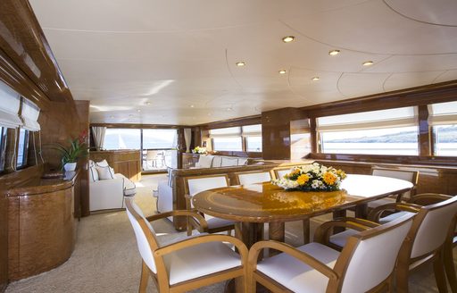 formal dining area in main salon of luxury yacht NOMI 